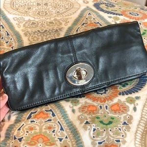 Brand new black leather coach clutch